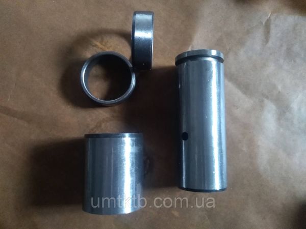Ось в сборе со втулками рамы Т-150 Оригинал (УМТК)